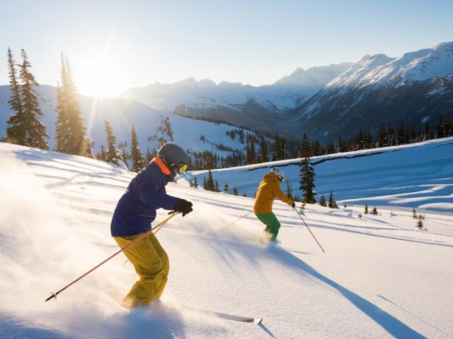 two people skiing